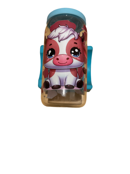 Highland cow with blue rubber lid