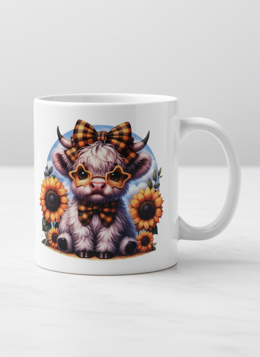 Highland cow with sunflowers