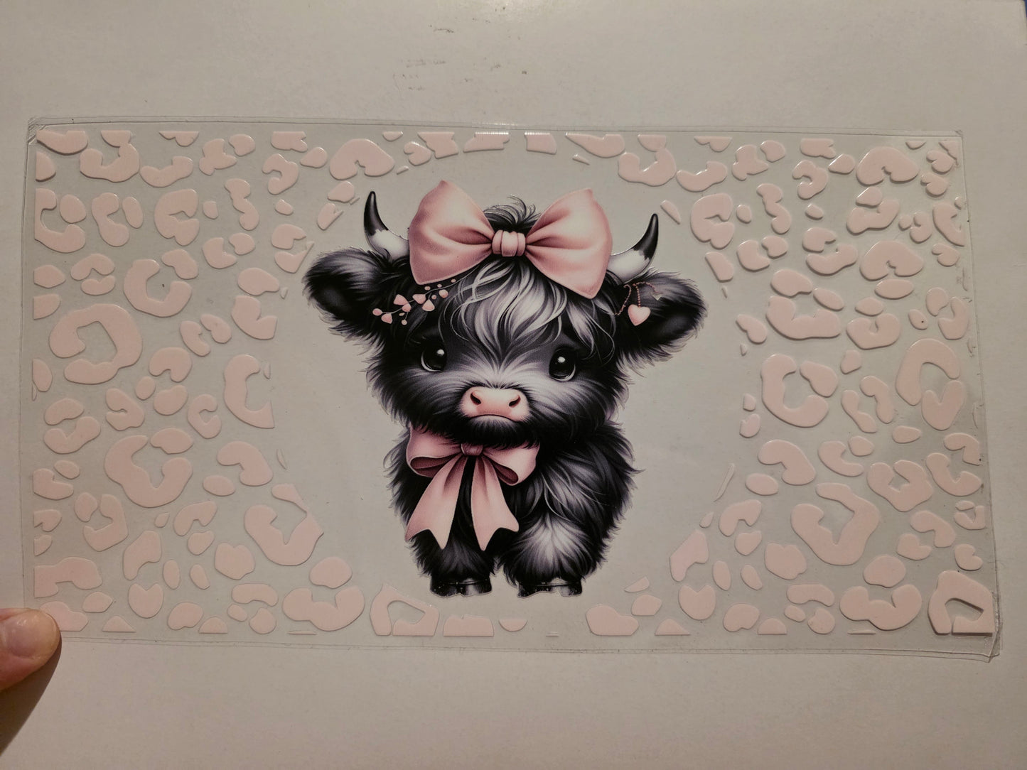 Highland cow with pink cow print