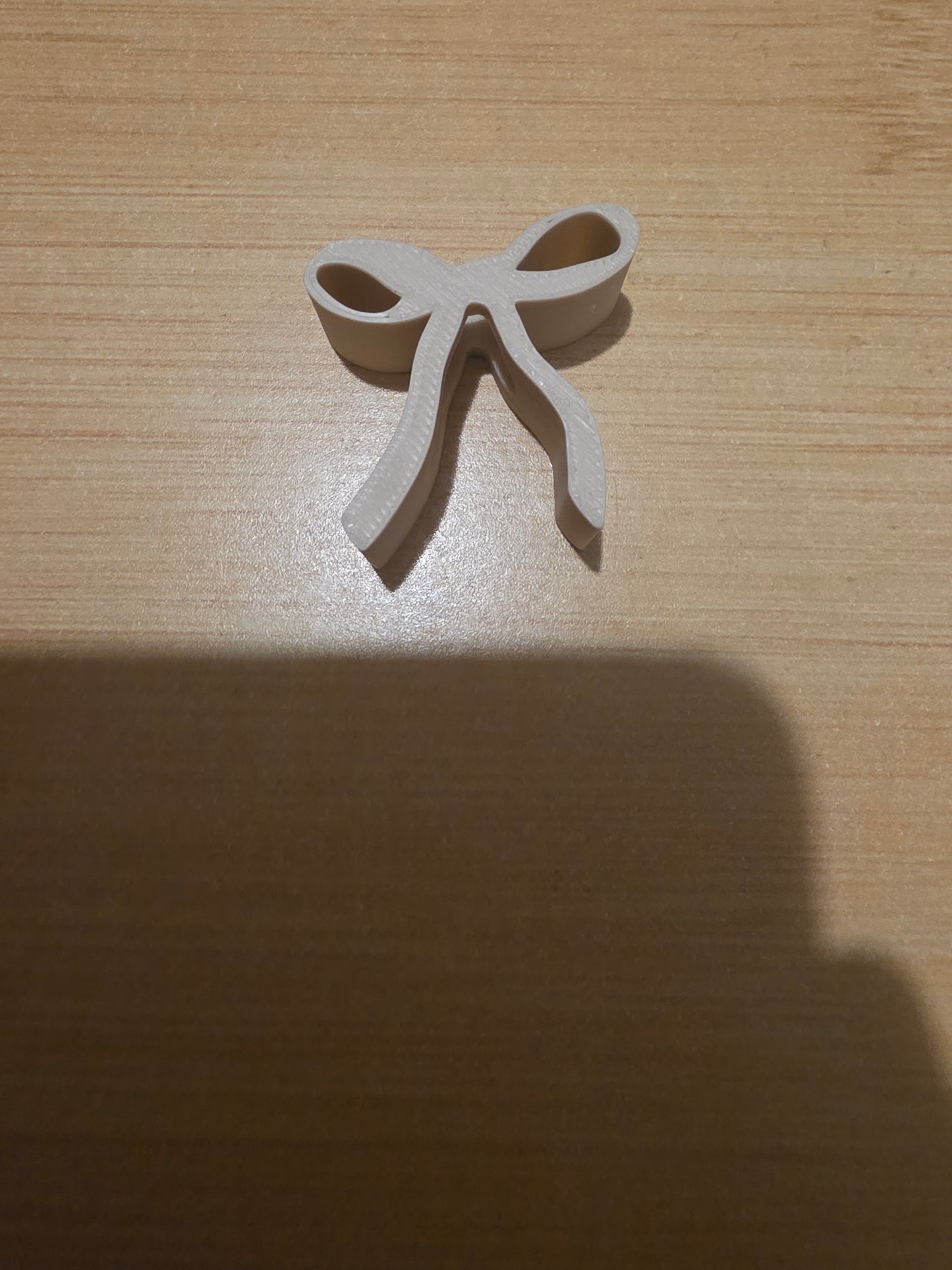 Light brown bow straw topper