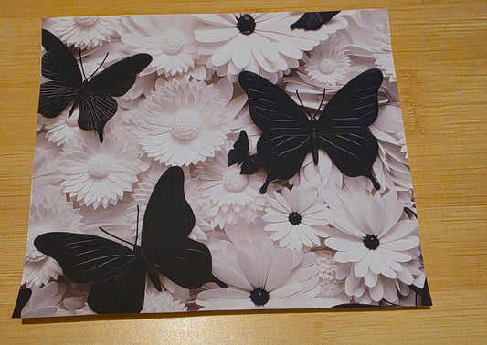 Black butterflies and white flowers