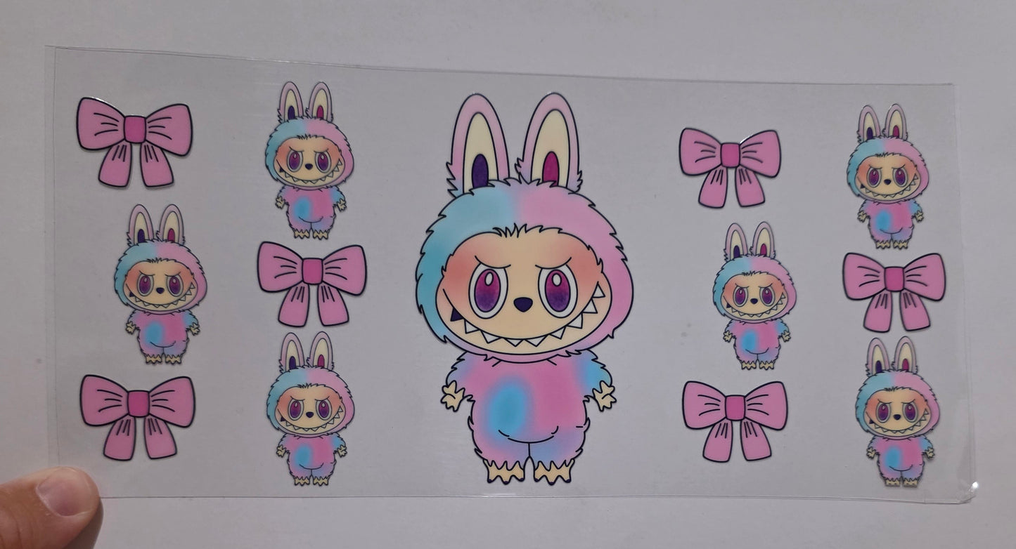Pink andblue labubu with pink bows