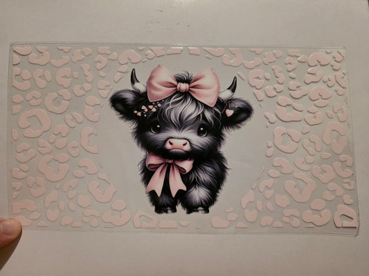 Highland cow with pink cow print